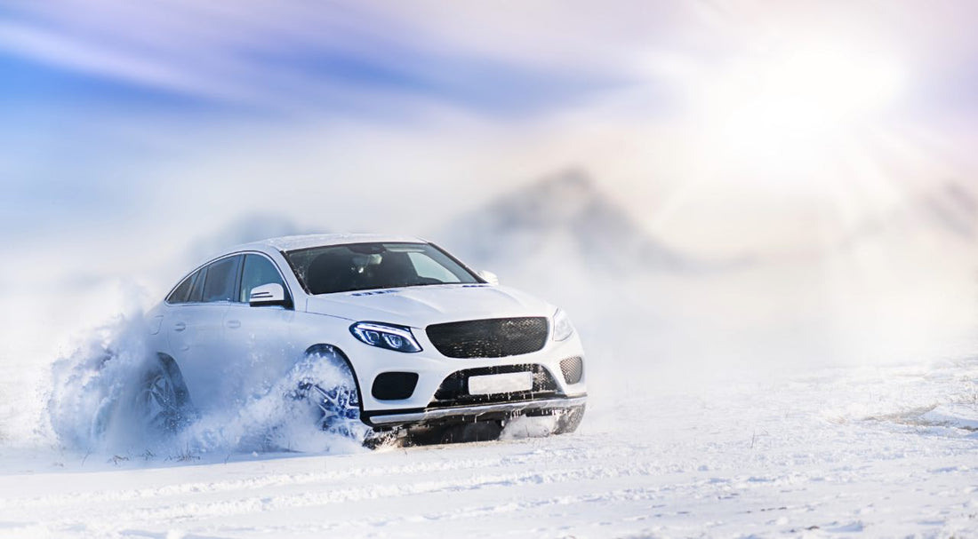 Armadillo Pro Shield hydrophobic marine ceramic sealer protects white SUV in snowy terrain